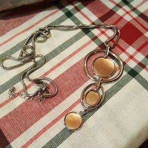 Silver and bronze colored circle necklace
